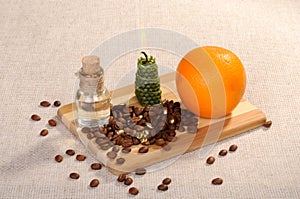 Set for aromatherapy. Coffee beans, aromatic massage oil in a glass bottle