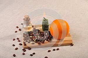 Set for aromatherapy. Coffee beans, aromatic massage oil in a glass bottle