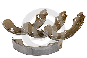 Set of asbestos brake pads, replacement spare parts of the car brake system, isolated on white background