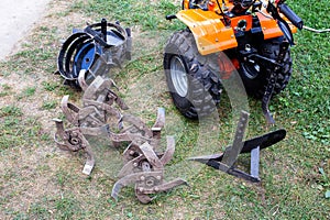 A set of attachments, hiller, milling cutters and lugs. Motoblock for agricultural work. Purchase and running-in of a