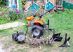 A set of attachments, hiller, milling cutters and lugs. Motoblock for agricultural work. Purchase and running-in of a