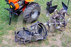 A set of attachments, hiller, milling cutters and lugs. Motoblock for agricultural work. Purchase and running-in of a