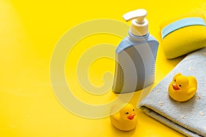 Set of baby hygiene and bath items with shampoo bottle and soap