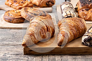 Set of bakery pastries on wooden table
