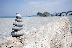 A set of balanced stones on beach