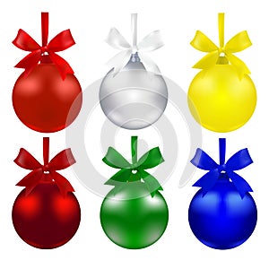 Set of balls. Christmas decorations. The symbols of the New Year. Red, green, silver, blue and yellow colors with bows