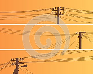 Set of banners of power line poles at sunset