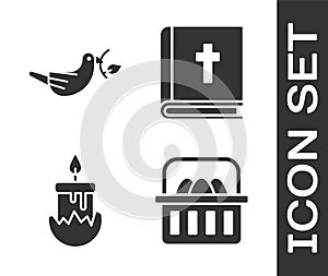 Set Basket with easter eggs, Peace dove with olive branch, Burning candle and Holy bible book icon. Vector