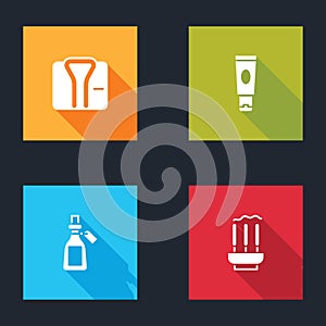 Set Bathrobe, Cream or lotion cosmetic tube, Essential oil bottle and Incense sticks icon. Vector