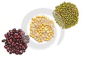 Set beans isolated on white background. Flat lay composition with different types of beans:  peas, red beans and mung beans.
