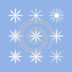 Set of beautiful symmetrical snowflakes for your winter design