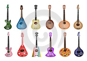 A Set of Beautiful Ukulele Guitars on White Backgr photo