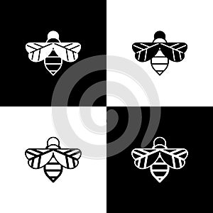 Set Bee icon isolated on black and white background. Sweet natural food. Honeybee or apis with wings symbol. Flying