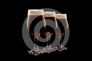 Set of Beer glasses on a black background. Mugs with drink like Ipa, Pale Ale, Pilsner, Porter or Stout