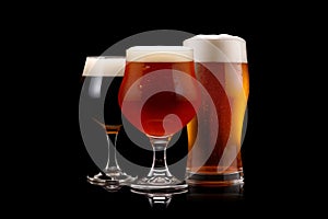 Set of Beer glasses on a black background. Mugs with drink like Ipa, Pale Ale, Pilsner, Porter or Stout