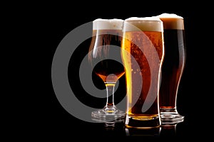 Set of Beer glasses on a black background. Mugs with drink like Ipa, Pale Ale, Pilsner, Porter or Stout