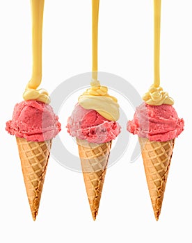Set of berry ice cream watered with condensed milk photo