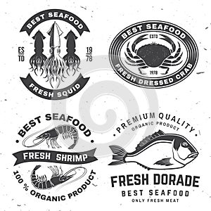 Set of best seafood badges. Fresh dorade, octopus, shrimp, shrimp, dressed crab, squid delicious. Vector. For seafood