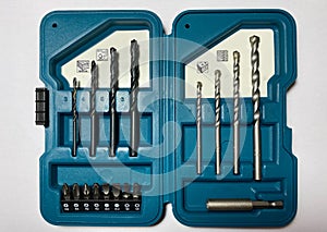 A set of bits and drills for wood, metal and brick in a beautiful box