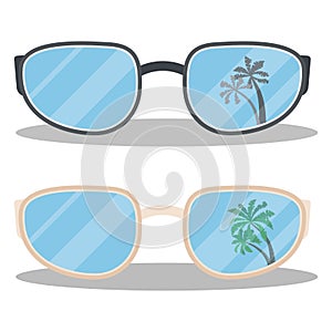 Set of black and beige summer sunglasses with palms reflection isolated on white background