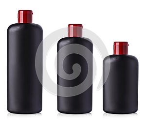 Set of Black blank plastic bottles isolated on white background