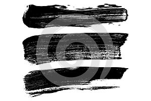 Set of black brush strokes isolated on white