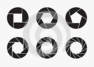 Set of black camera lens aperture icons.