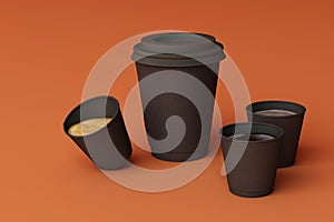 Set of black coffee cups on brown background.