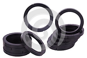 Set of black gaskets isolated. Oil seals for hydraulic cylinders for Industrial on white background.