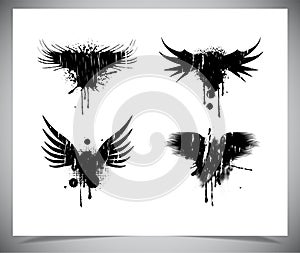 Set of black grunge wings.