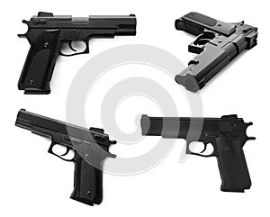 Set with black handguns on white background