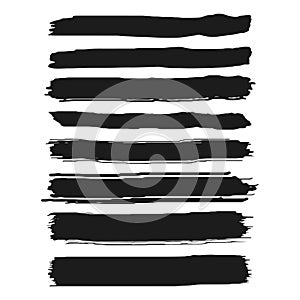 Set of black paint, ink brush strokes, brushes, lines. Grunge artistic design elements. Isolated on white background