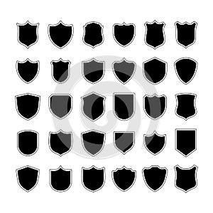 set of black silhouette shield badges with outline vector illustration