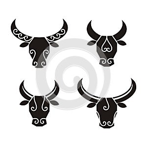 Set of black silhouettes of bull heads