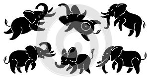 Set of black silhouettes of elephants. Cute cartoon elephants in different poses. Vector illustration isolated on white