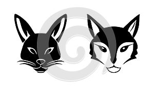 Set of black silhouettes of hare heads. Rabbit vector illustration