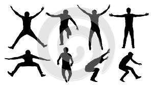 Set of black vector silhouettes of jumping or falling man isolated on white background