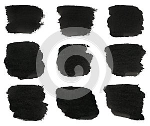 Set of black watercolor hand paint brush strokes are isolated on a white background.