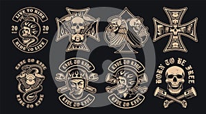 Set of black and white biker emblems on a dark background