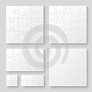 Set of black and white puzzle pieces. Has different sizes namely 100, 15, 25, 9, 4, 8 pieces. Realistic mackup with shadow - stock