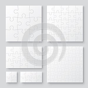 Set of black and white puzzle pieces. Has different sizes namely 100, 15, 25, 9, 4, 8 pieces. Realistic mackup with shadow - stock photo