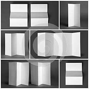 Set of blank brochures on dark grey background. Mock up for