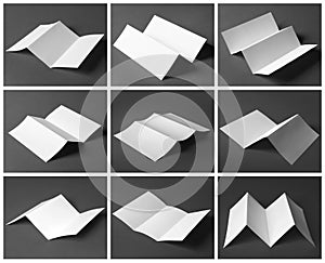 Set of blank brochures on dark grey . Mock up for design