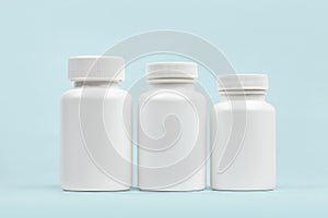 Set of blank dietary supplement bottles photo