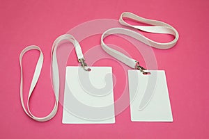 A set of blank ID on a pink background