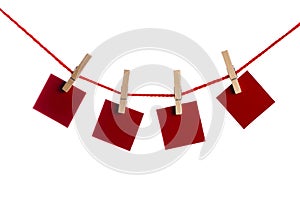 Set of blank notes held on string isolated