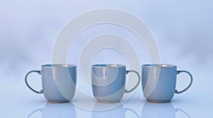 A set of blue coffee mugs