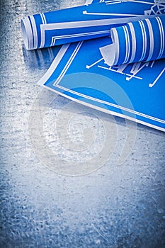 Set of blue engineering drawings on metallic background construc