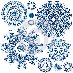 Set of blue floral circle patterns. Background in the style