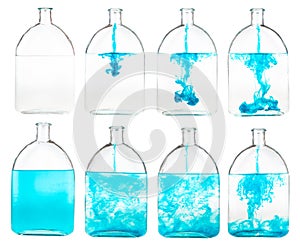 Set of blue ink solutions in glass flask isolated